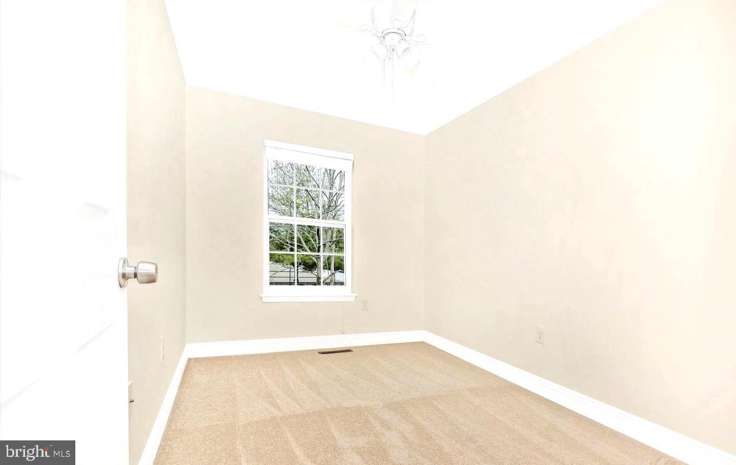 459 Arwell Court Frederick, MD 21703 - Photo 11 of 19 a view of an empty room with a window