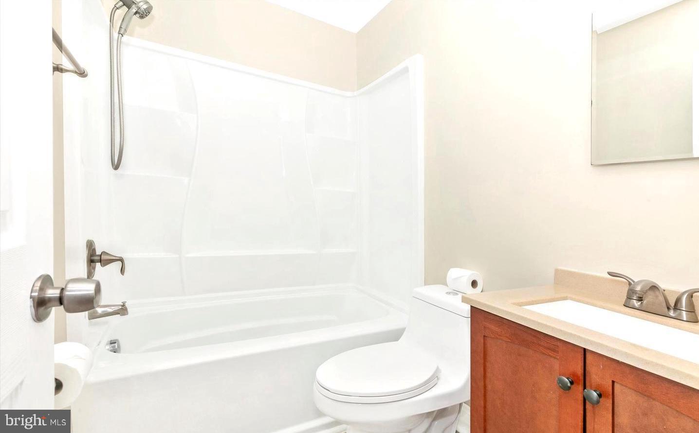 459 Arwell Court Frederick, MD 21703 - Photo 12 of 19 a bathroom with a sink a toilet and shower