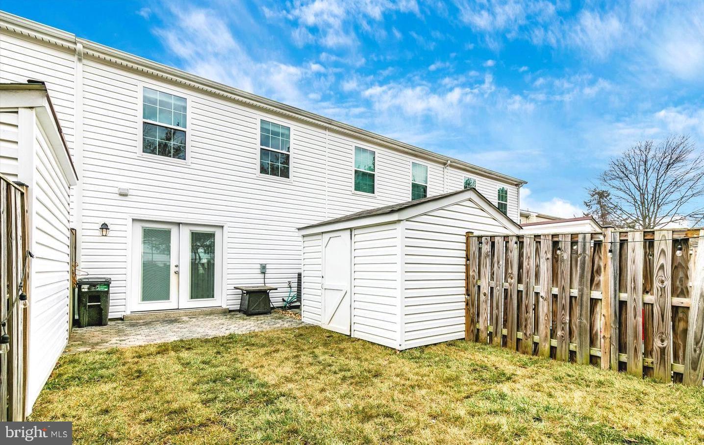 459 Arwell Court Frederick, MD 21703 - Photo 18 of 19 a view of a house with backyard and chair