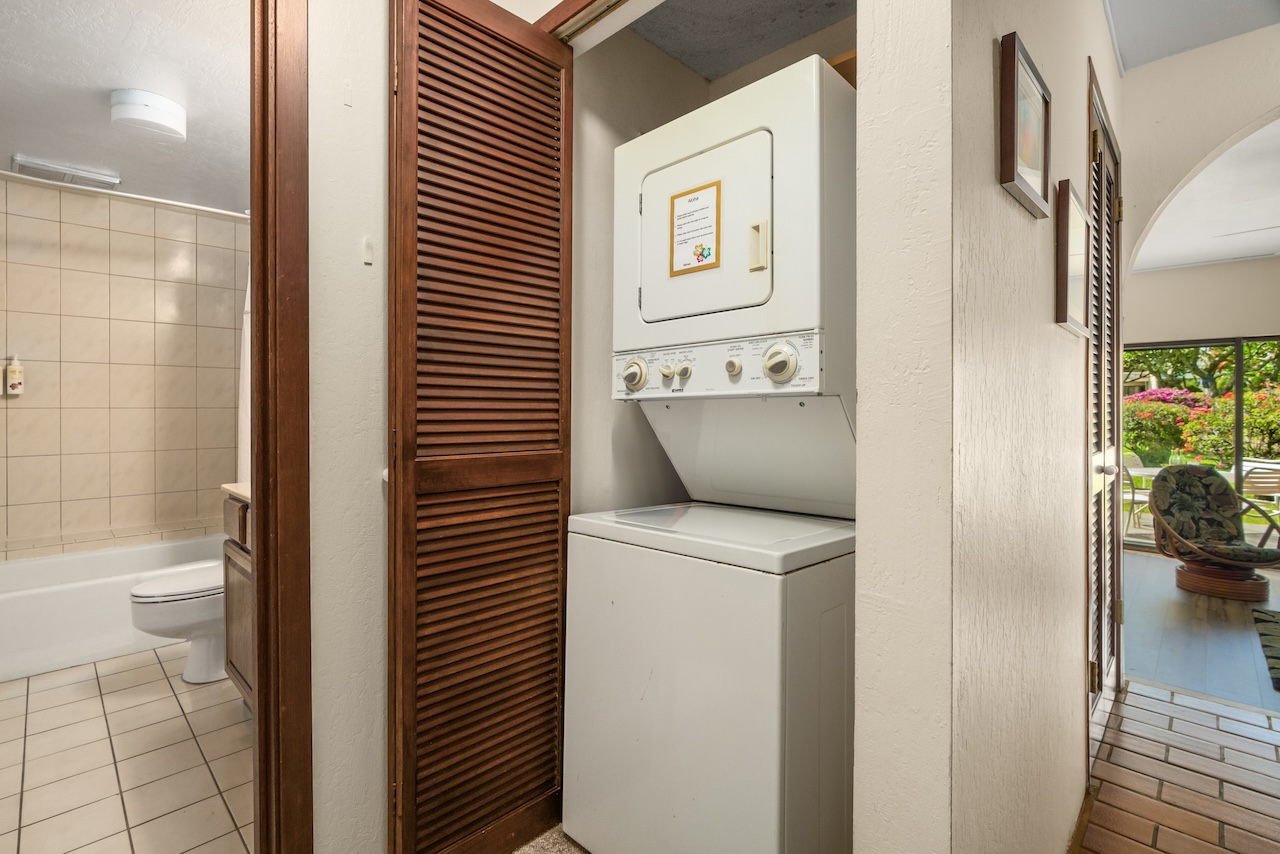 1901 Poipu Road, Unit 411 Koloa, HI 96756 - Photo 15 of 28 a view of bathroom with a toilet and a shower