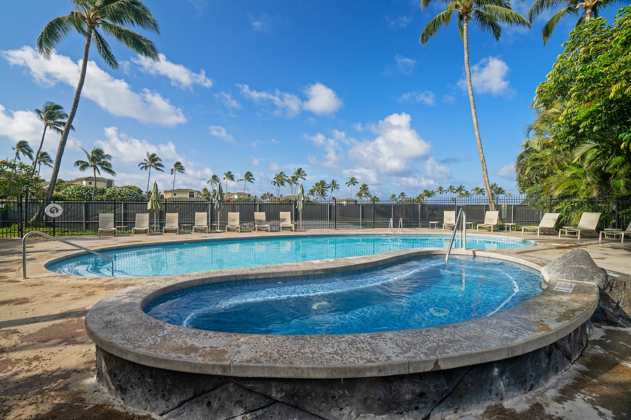 1901 Poipu Road, Unit 411 Koloa, HI 96756 - Photo 21 of 28 a view of a swimming pool with a terrace