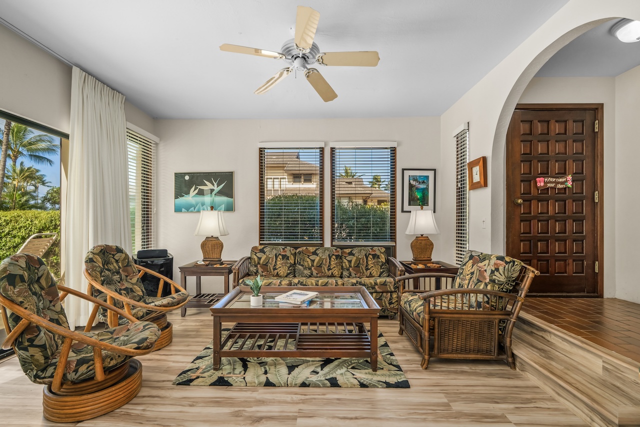 1901 Poipu Road, Unit 411 Koloa, HI 96756 - Photo 3 of 28 a living room with furniture and a large window