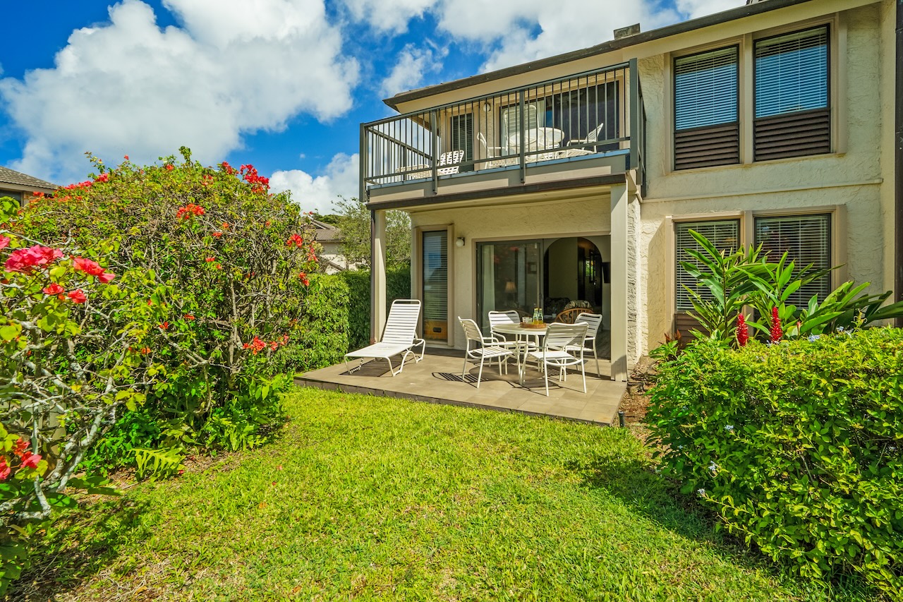 1901 Poipu Road, Unit 411 Koloa, HI 96756 - Photo 4 of 28 a view of a house with sitting area and garden
