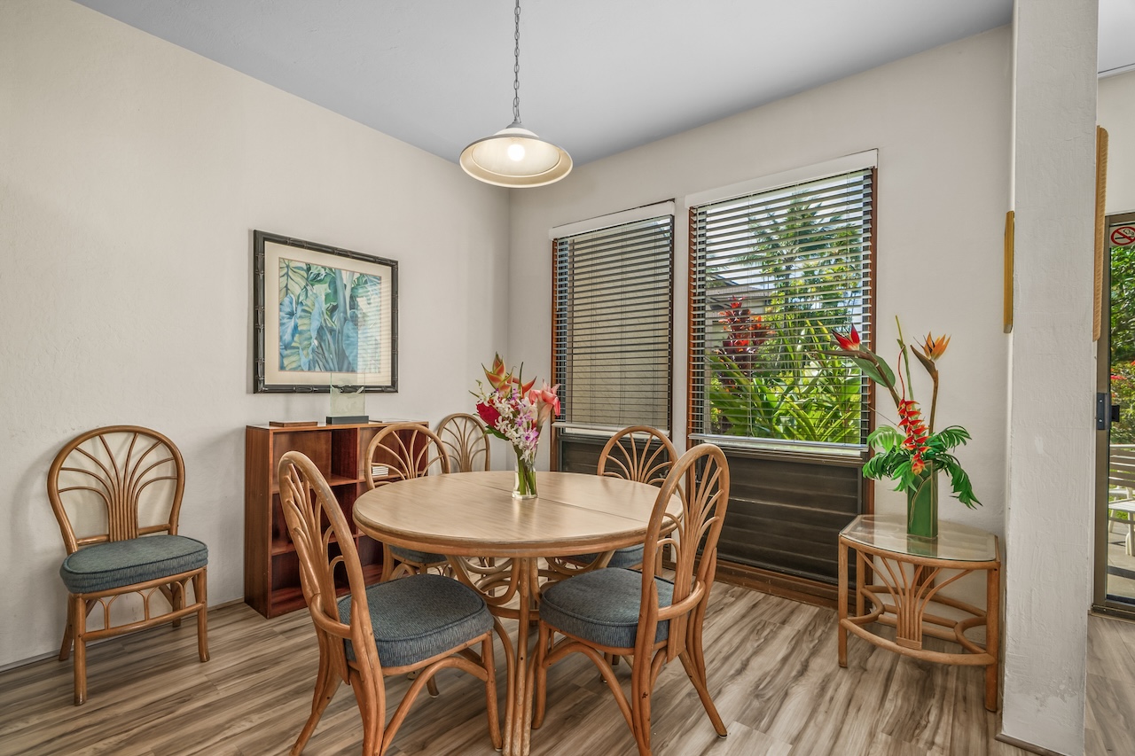 1901 Poipu Road, Unit 411 Koloa, HI 96756 - Photo 7 of 28 a dining room with furniture and window