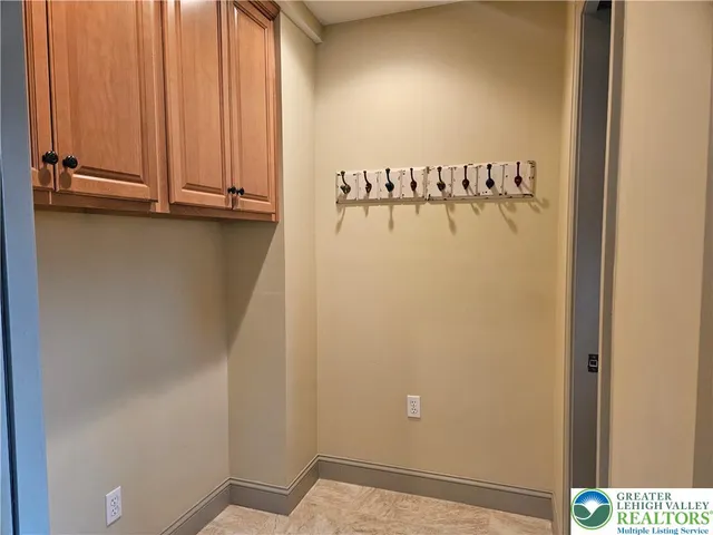 a kitchen with stainless steel appliances granite countertop a sink and a granite counter tops