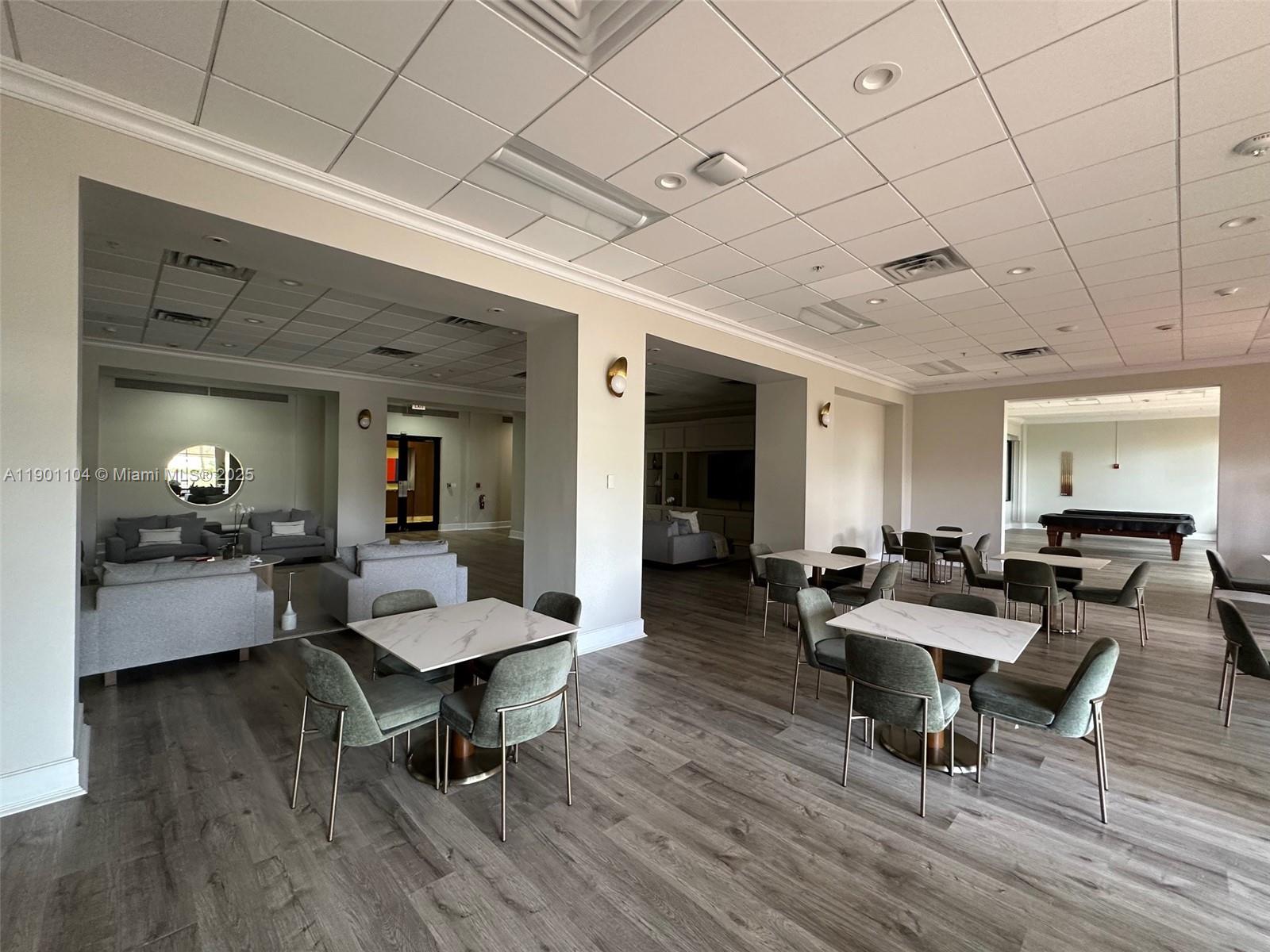 5600 Collins Avenue, Unit 9E Miami Beach, FL 33140 - Photo 54 of 55 a living room with furniture and wooden floor