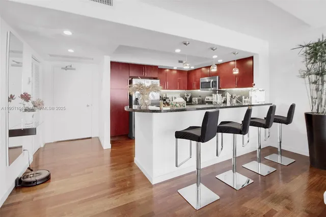a dining room with furniture window wooden floor