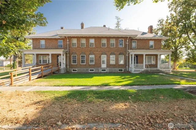 a view of a house with a swimming pool