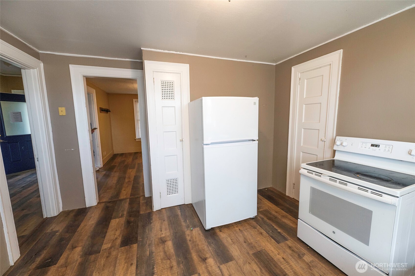 202 West 1st Street Prescott, WA 99348 - Photo 40 of 40 a kitchen with a refrigerator and a stove
