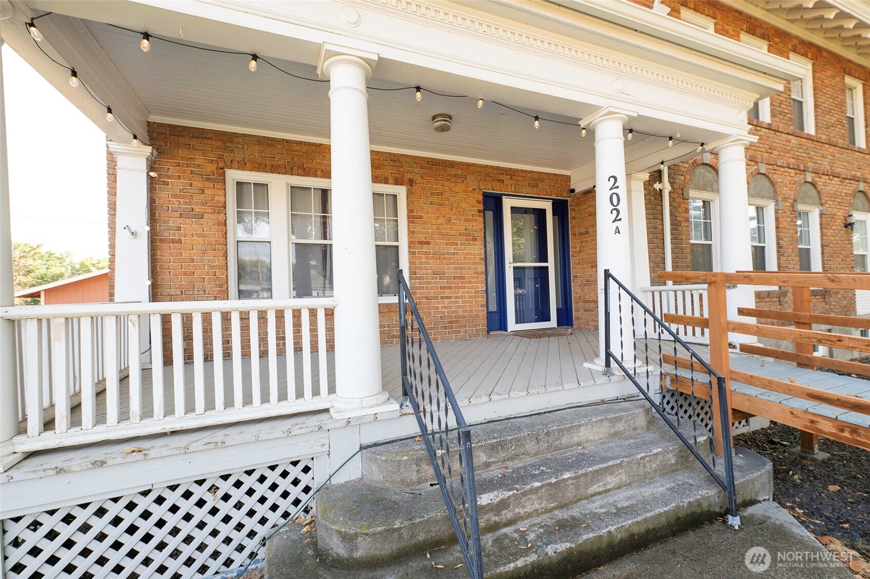 202 West 1st Street Prescott, WA 99348 - Photo 7 of 40 a view of a balcony with wooden fence