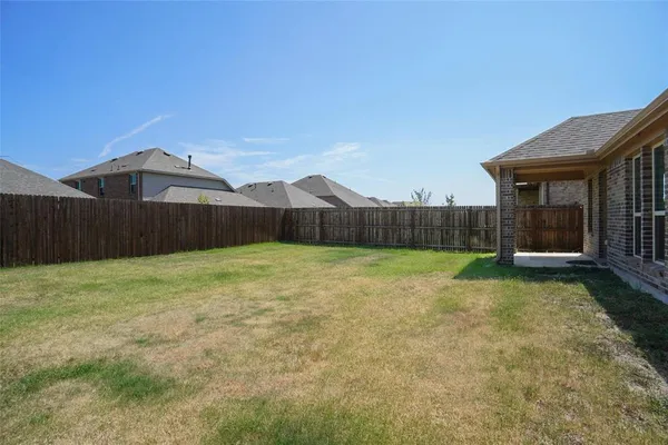 a view of a backyard with a garden