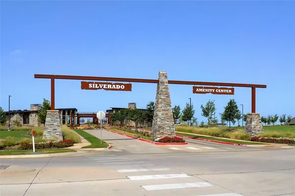 a view of street with parked cars