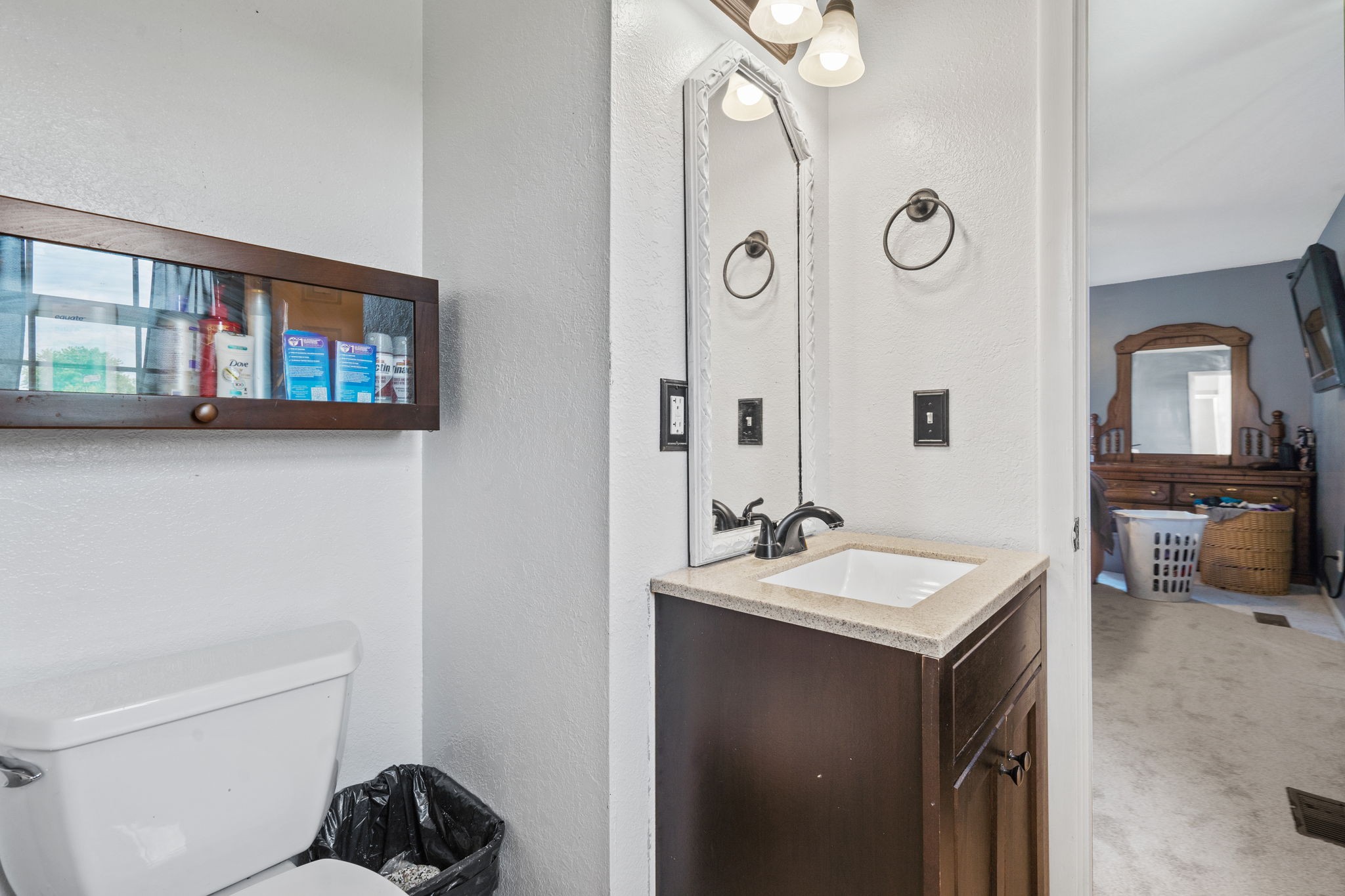 277 Harrison Road Spring City, TN 37381 - Photo 21 of 36 a en suite bathroom with a sink and a mirror