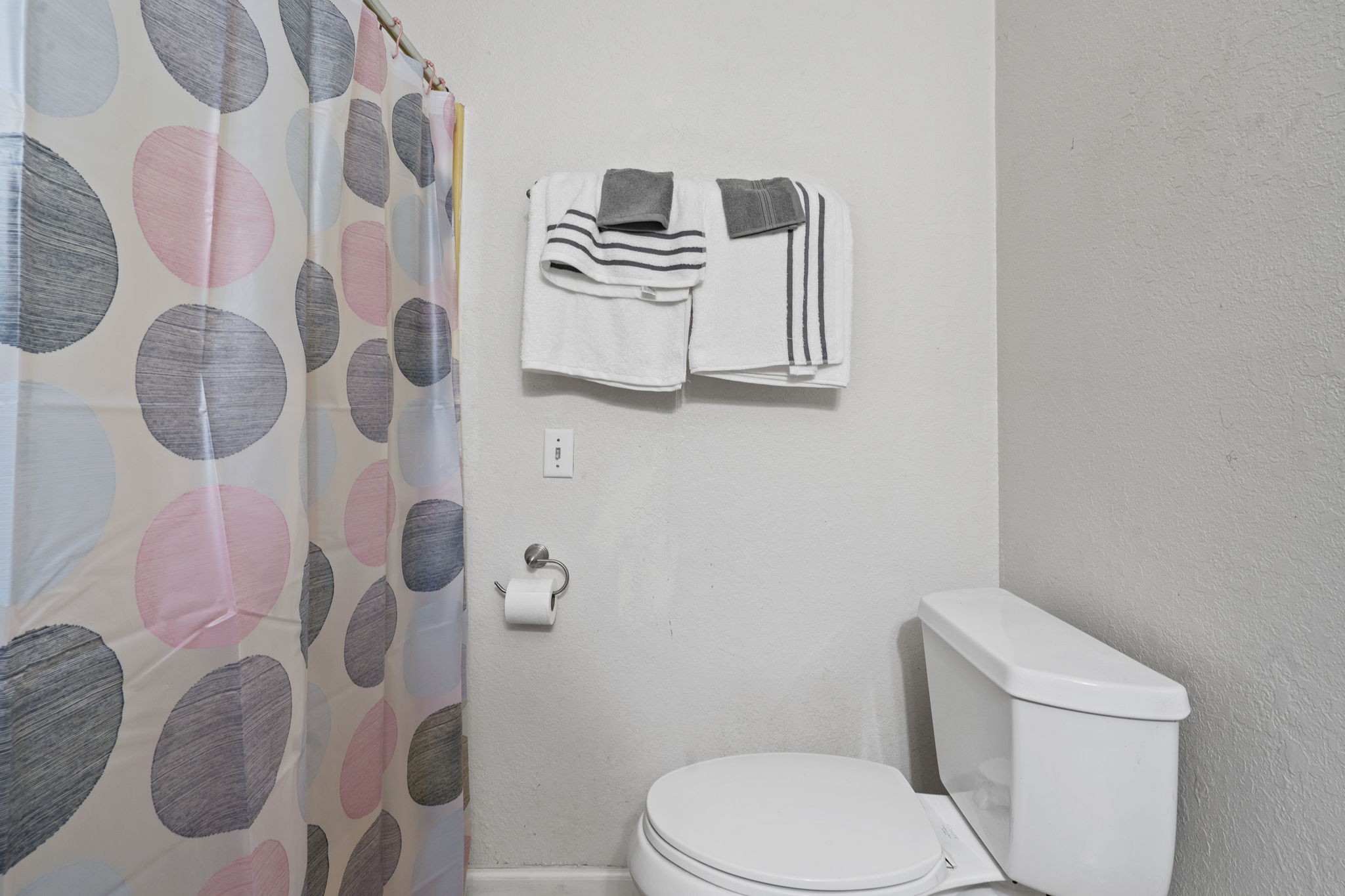 277 Harrison Road Spring City, TN 37381 - Photo 24 of 36 a white toilet sitting next to a shower