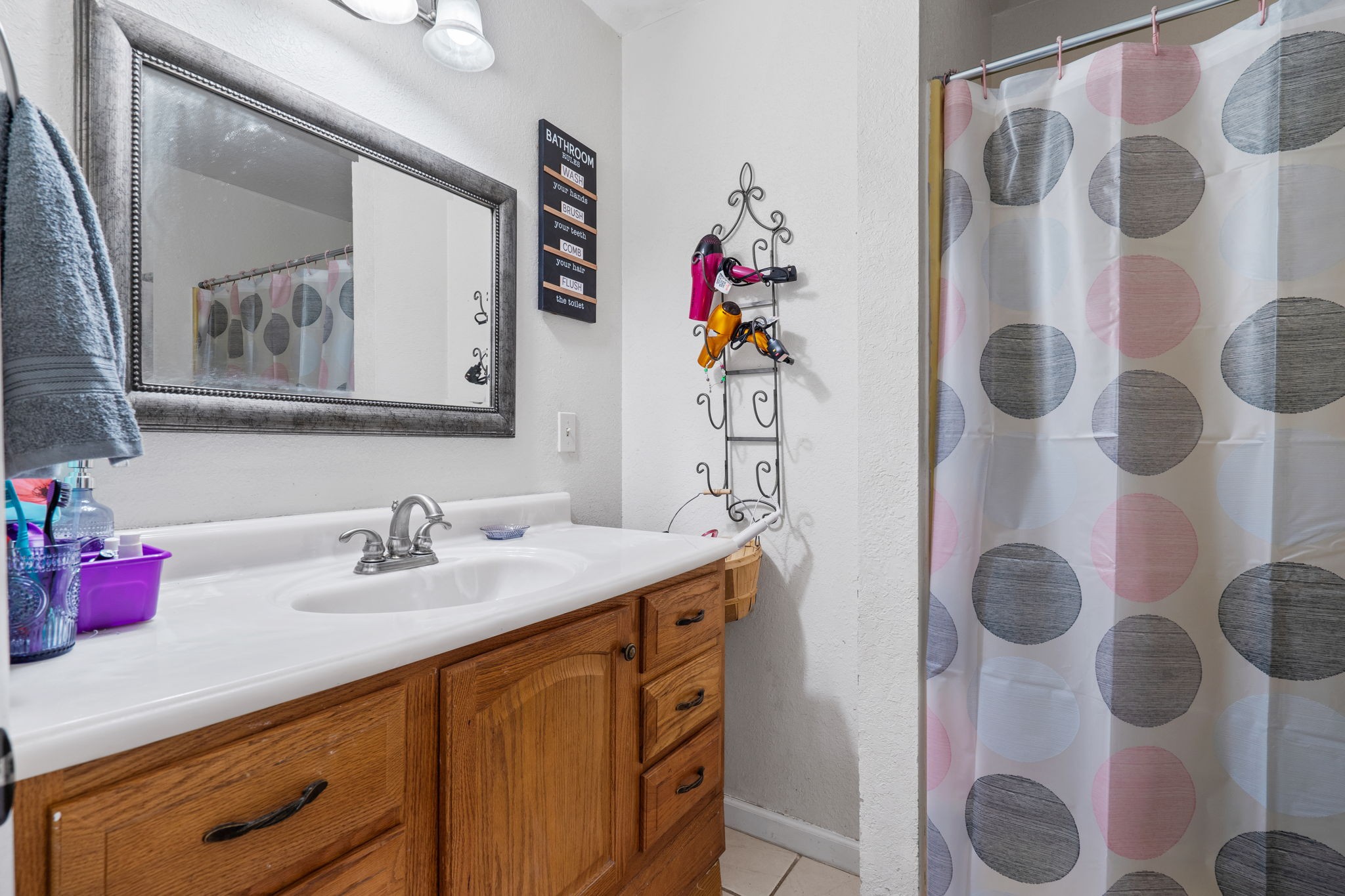 277 Harrison Road Spring City, TN 37381 - Photo 25 of 36 a bathroom with a sink vanity and toilet