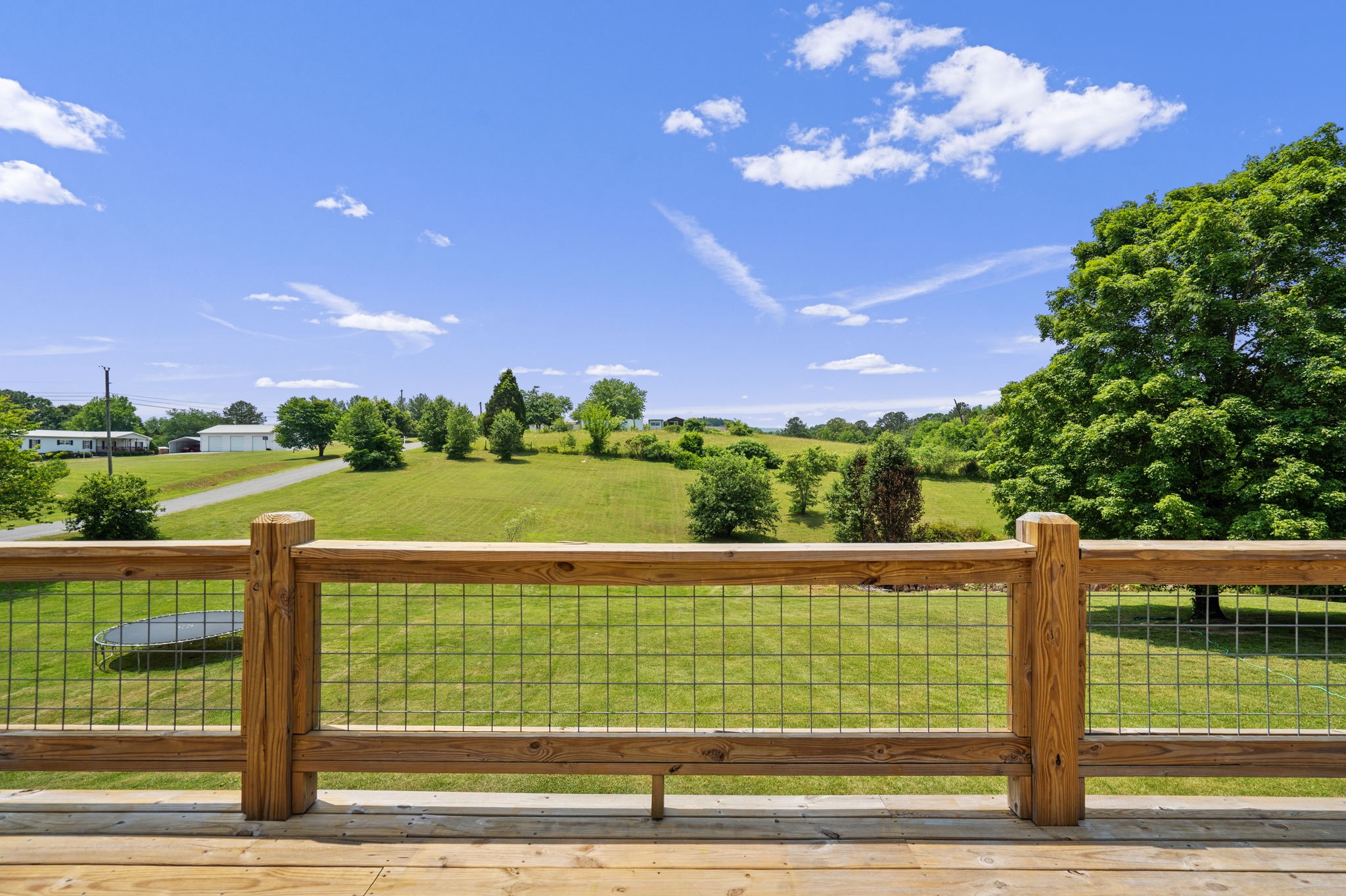 277 Harrison Road Spring City, TN 37381 - Photo 9 of 36 a view of a yard with an outdoor space