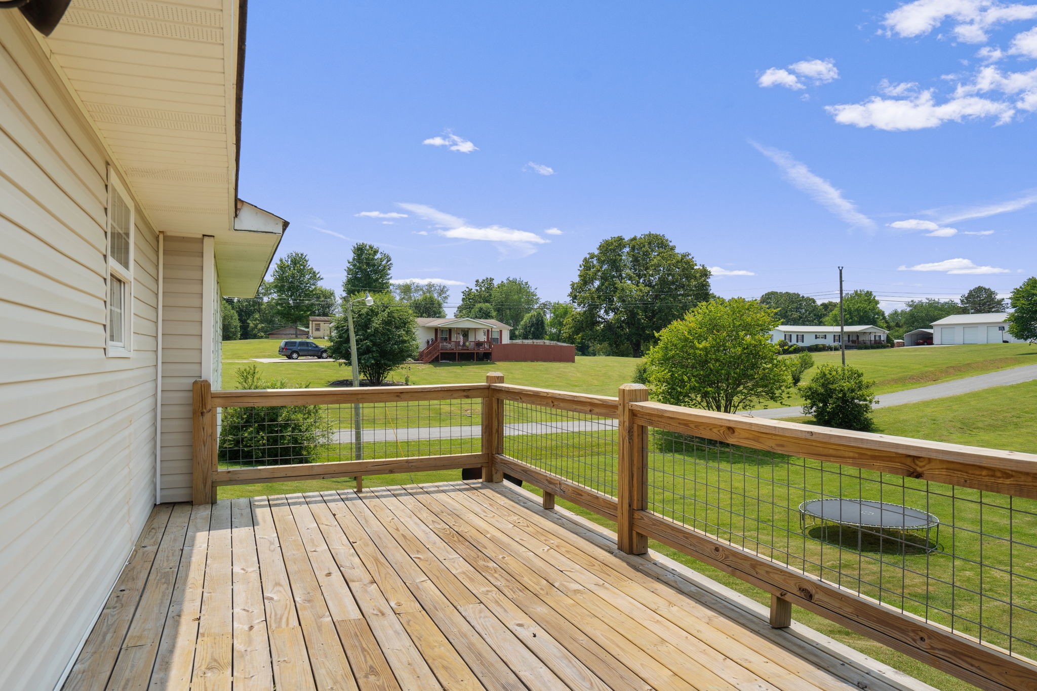 277 Harrison Road Spring City, TN 37381 - Photo 10 of 36 a view of a balcony with staircase