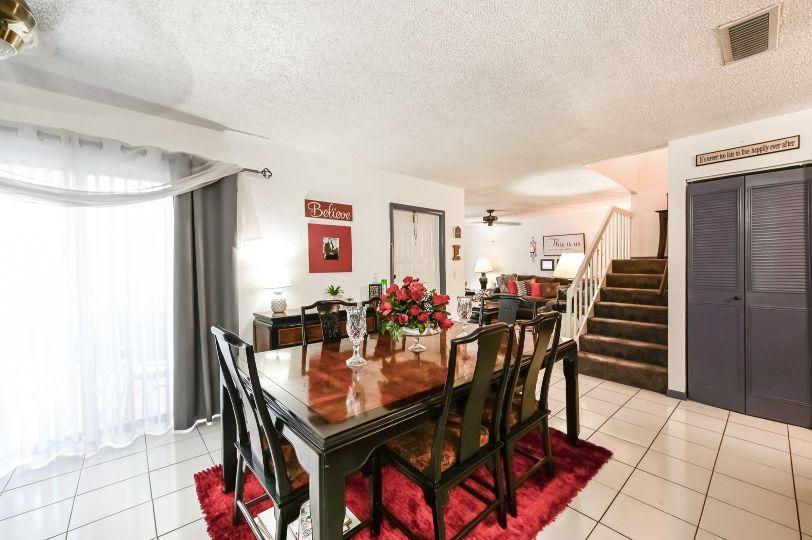 126 Woodland Road Palm Springs, FL 33461 - Photo 7 of 19 a view of a dining room with furniture