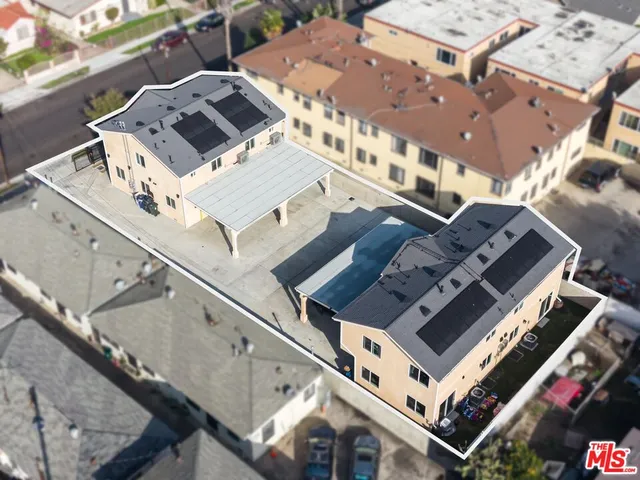 an aerial view of a building with entryway