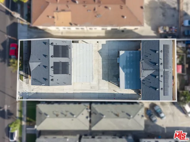 a view of dining room with a table and chairs