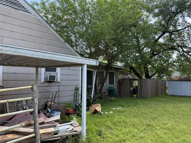 a backyard of a house with seating space