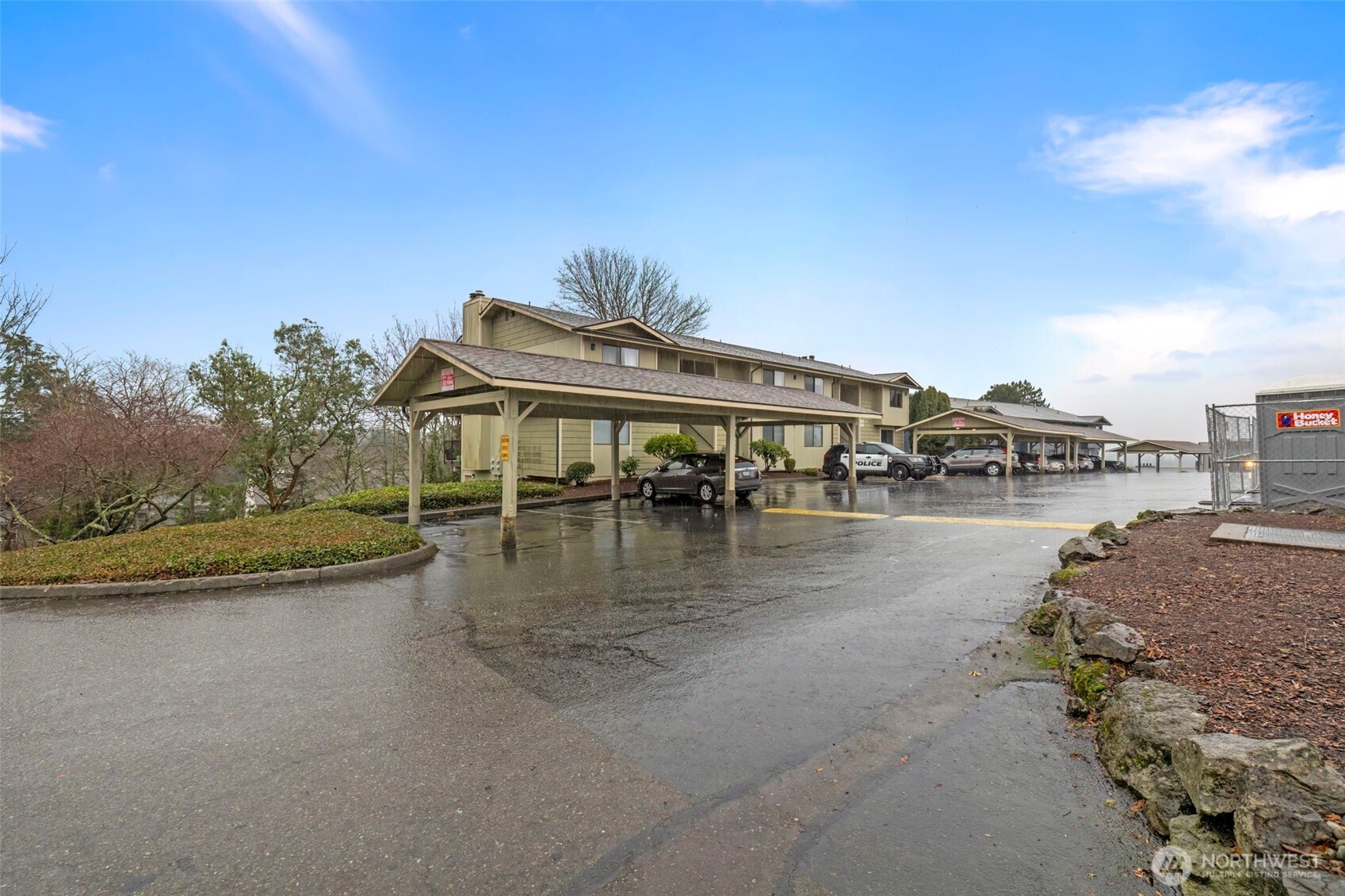 3400 Narrows View Lane Northeast, Unit 204 Bremerton, WA 98310 - Photo 1 of 38 a view of a lake with houses