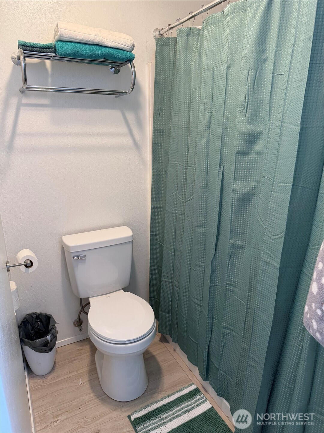 3400 Narrows View Lane Northeast, Unit 204 Bremerton, WA 98310 - Photo 22 of 38 a bathroom with a toilet and a shower