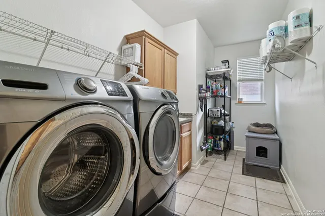 a bathroom with a sink double vanity and a mirror
