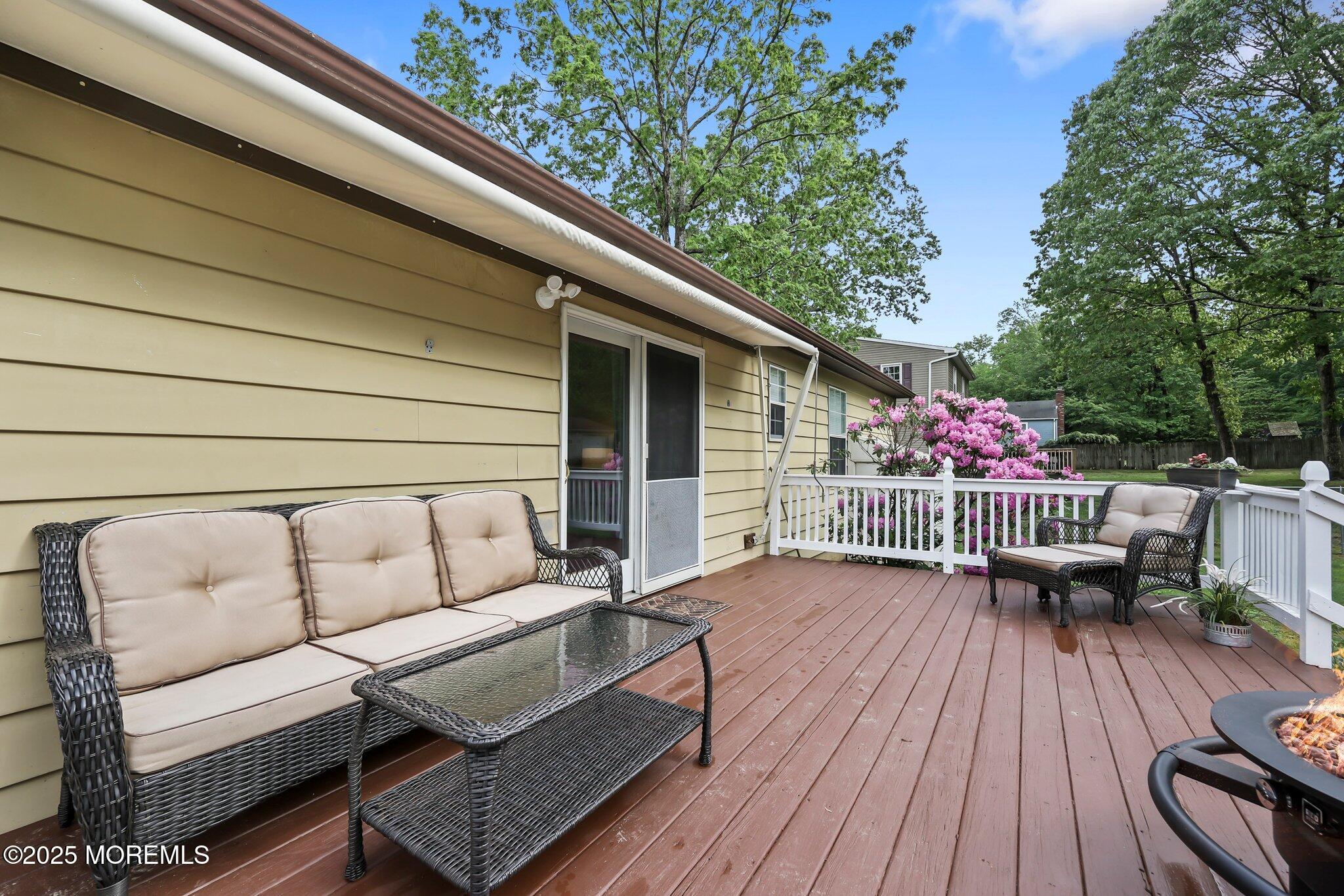 342 Diamond Road Jackson, NJ 08527 - Photo 30 of 30 a balcony with wooden floor and outdoor seating