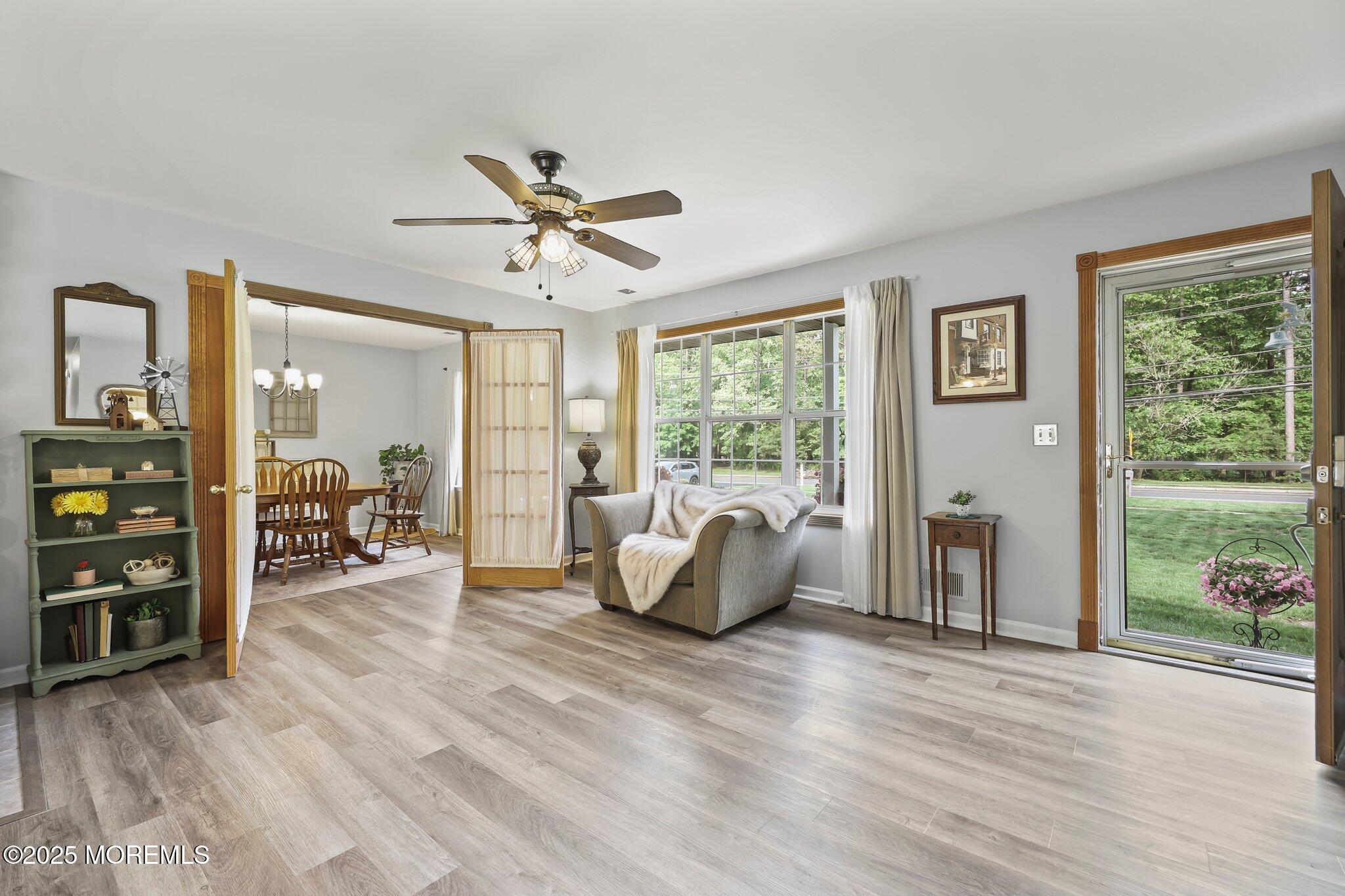 342 Diamond Road Jackson, NJ 08527 - Photo 6 of 30 a living room with furniture and a floor to ceiling window