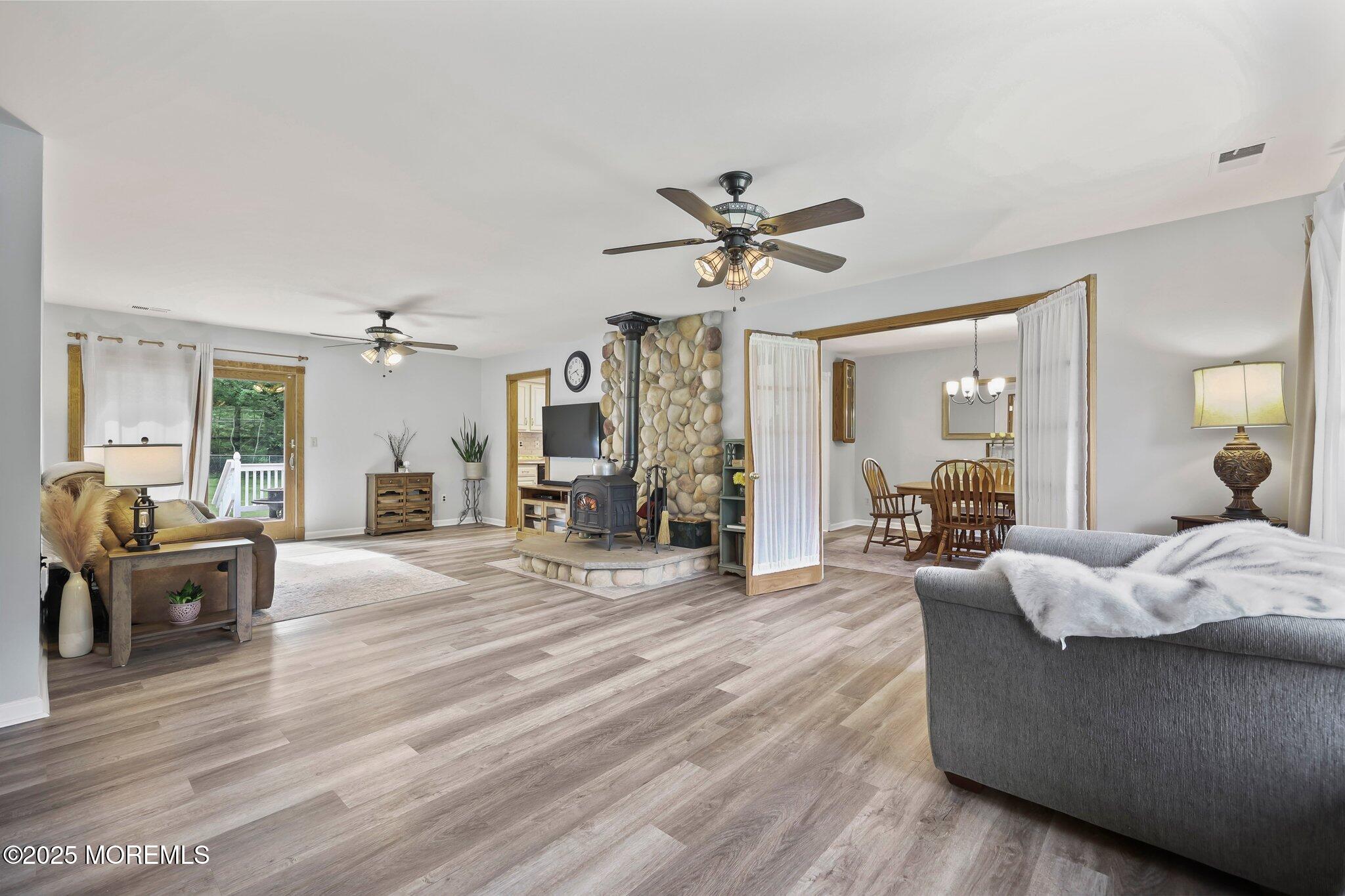 342 Diamond Road Jackson, NJ 08527 - Photo 7 of 30 a living room with furniture and a wooden floor