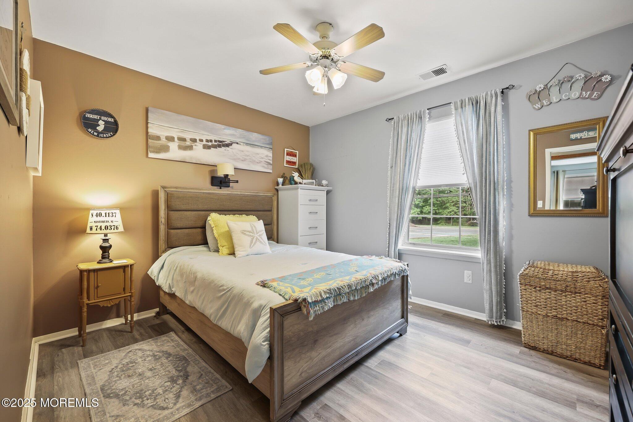 342 Diamond Road Jackson, NJ 08527 - Photo 8 of 30 a bedroom with a bed and window