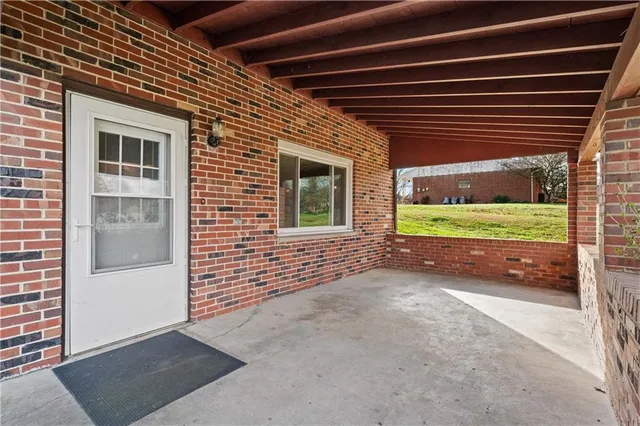 a view of a porch with a backyard