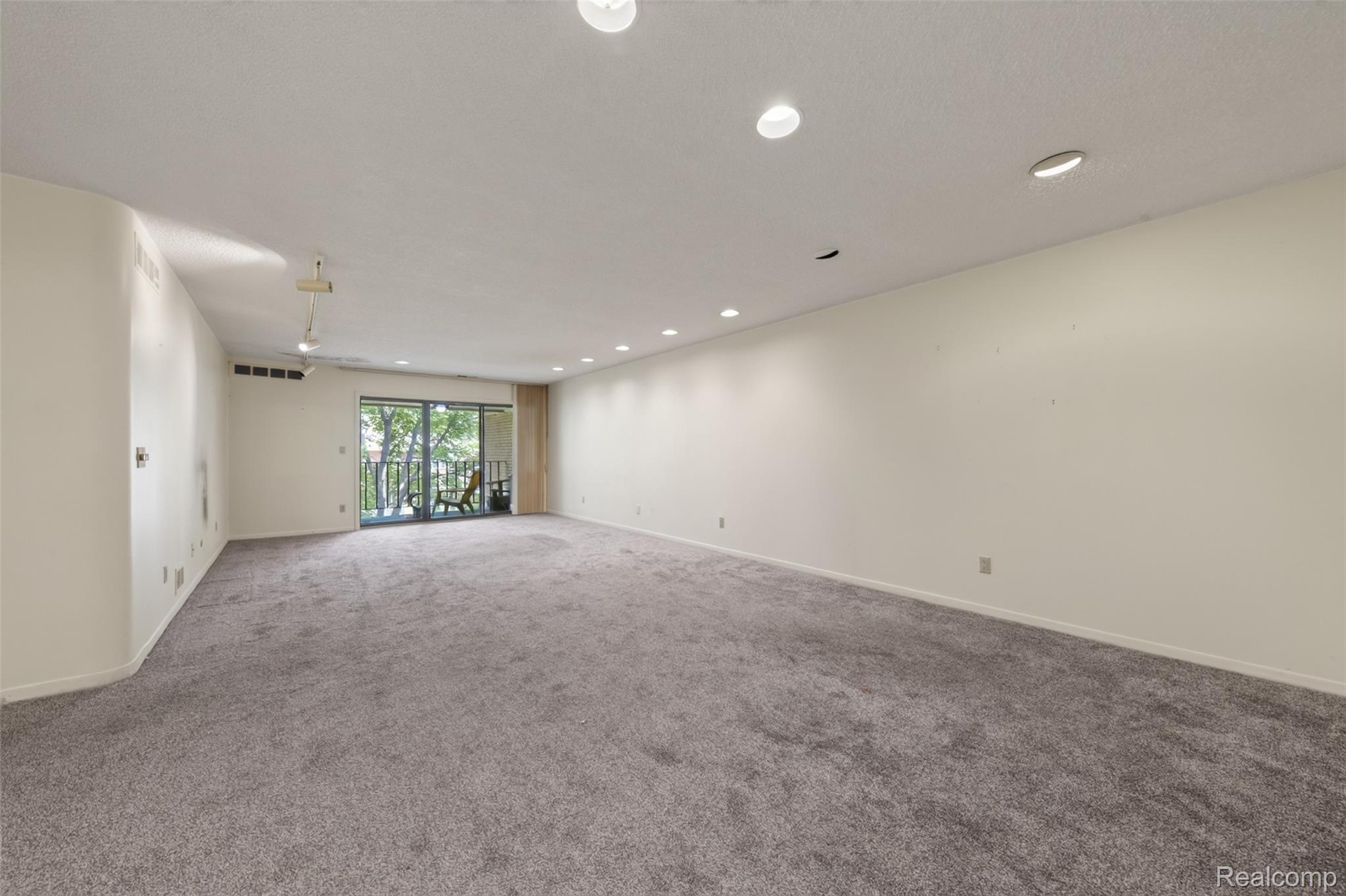 31915 West 14 Mile Road Farmington, MI 48334 - Photo 20 of 47 Recessed lighting, ceiling fan, neutral carpet, sliding glass door, and a private balcony