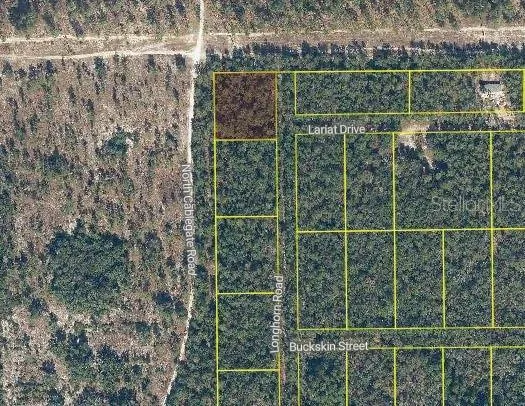 a view of a bathroom with a shower and a sink