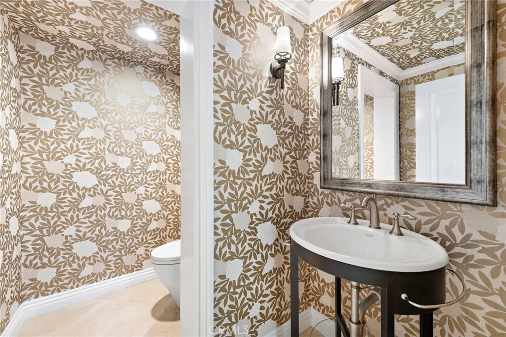 27 Pacific Mist Newport Coast, CA 92657 - Photo 19 of 44 a bathroom with a sink and a mirror