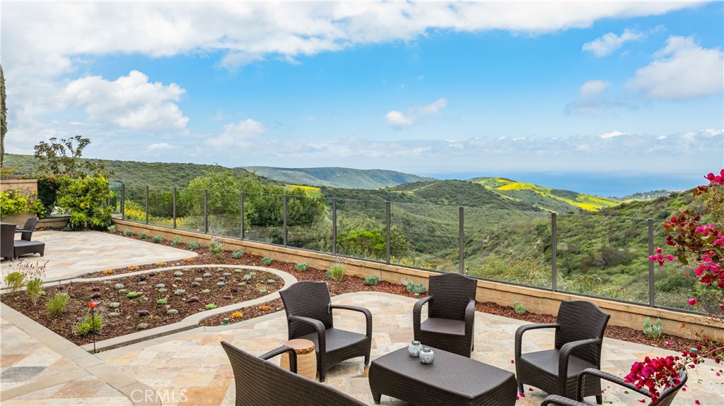 27 Pacific Mist Newport Coast, CA 92657 - Photo 2 of 44 a view of a patio with furniture