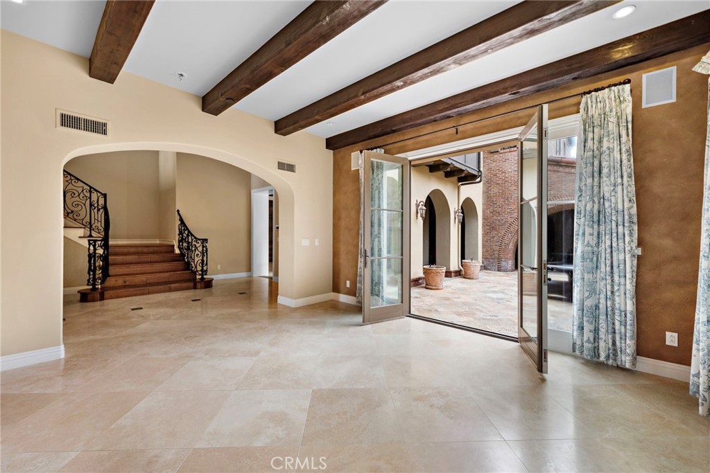 27 Pacific Mist Newport Coast, CA 92657 - Photo 23 of 44 a view of a hallway with stairs
