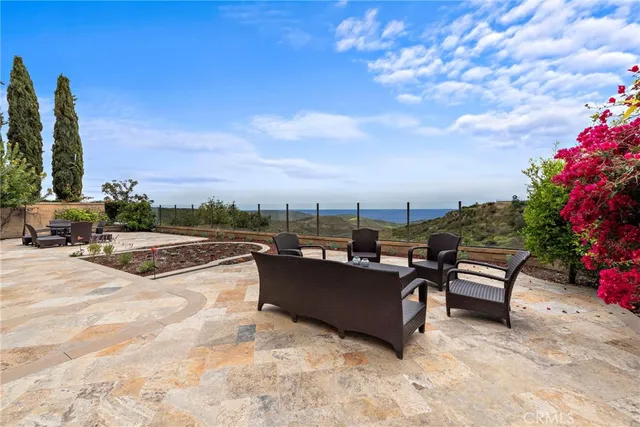 a view of a terrace with furniture