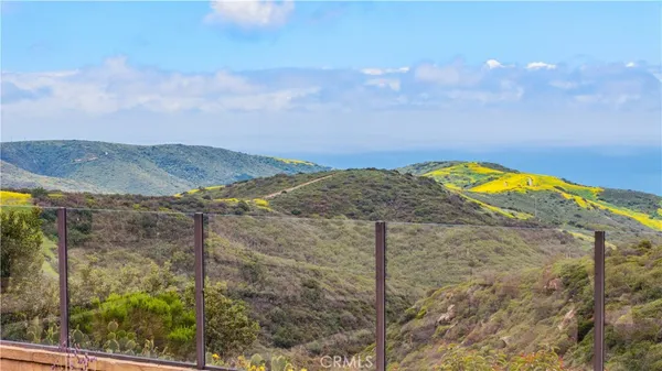 a view of swimming pool and mountain in back