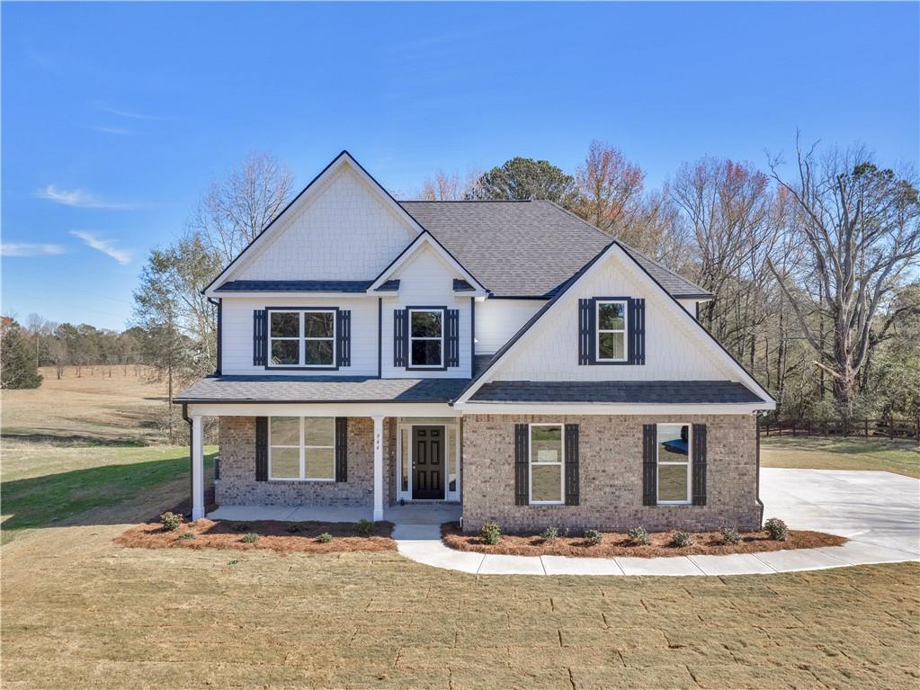 944 Snapping Shoals Road McDonough, GA 30252 - Photo 1 of 1 a front view of a house with a yard
