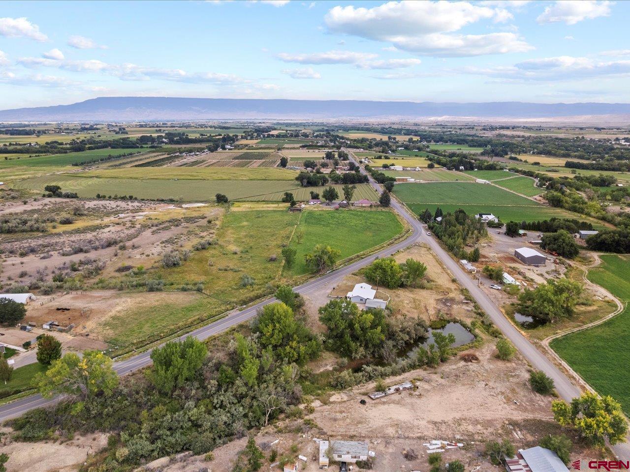 6910 High Mesa Road Olathe, CO 81425 - Photo 2 of 40 a view of a city with a lake