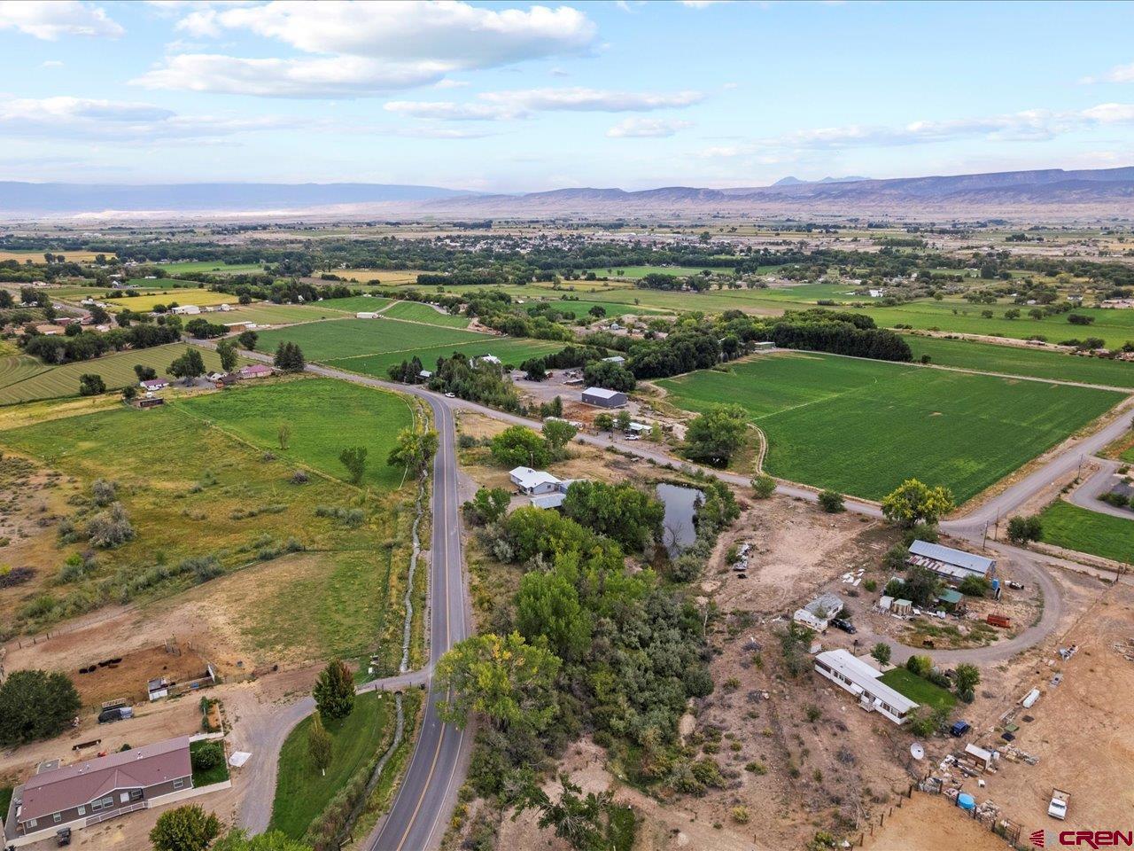 6910 High Mesa Road Olathe, CO 81425 - Photo 5 of 40 a view of a city with an ocean