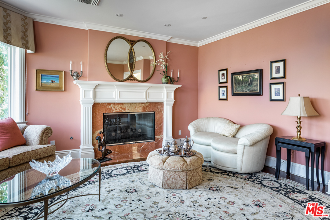 150 Patrician Way Pasadena, CA 91105 - Photo 15 of 43 a living room with furniture and a fireplace