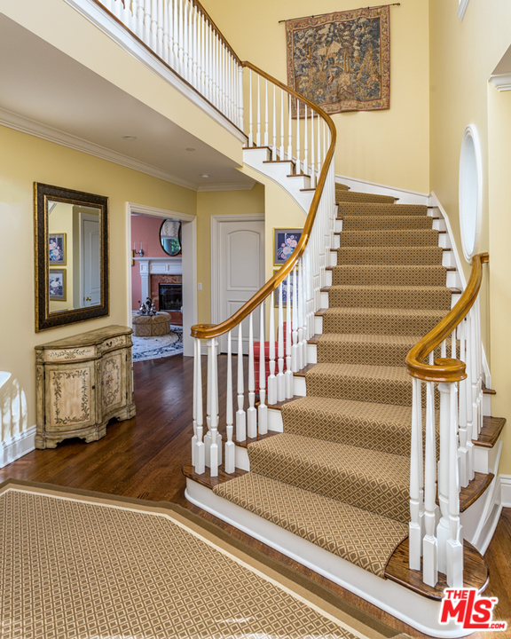 150 Patrician Way Pasadena, CA 91105 - Photo 3 of 43 a view of entryway and hall with wooden floor