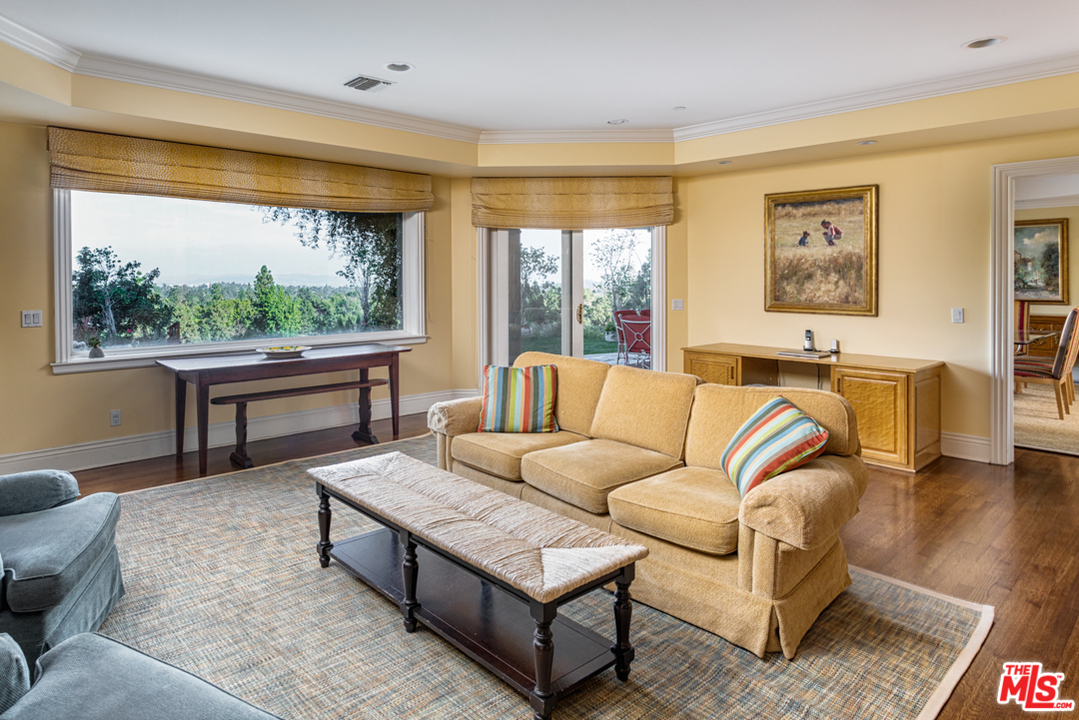 150 Patrician Way Pasadena, CA 91105 - Photo 6 of 43 a living room with furniture and a large window