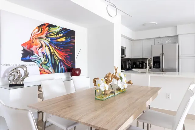 a view of city from balcony with seating space