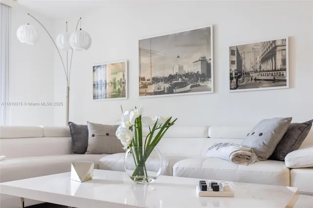 a bathroom with a sink and a large mirror