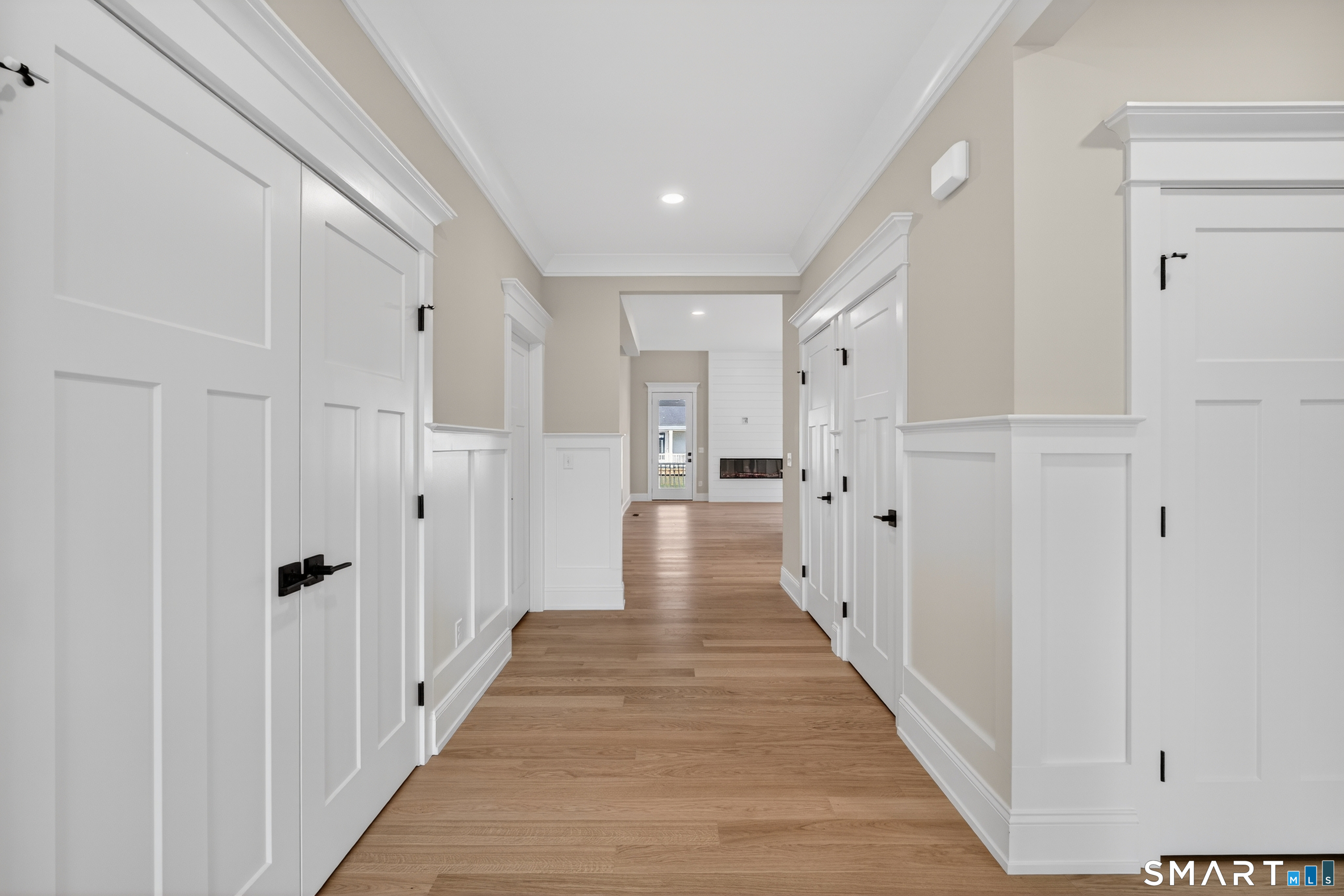 45 Summertime Circle Pawcatuck, CT 06379 - Photo 17 of 37 a view of a hallway with wooden floor and staircase