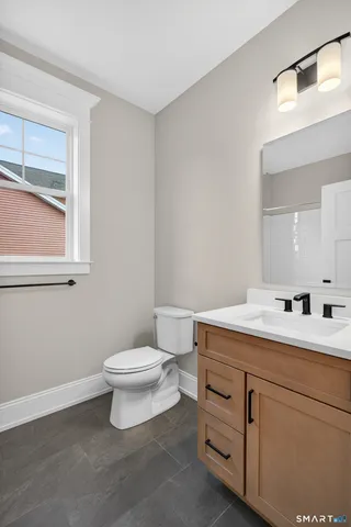 a bathroom with a shower and a bath tub